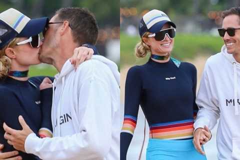 Paris Hilton & husband Carter Reum share a sweet kiss while vacationing in Maui