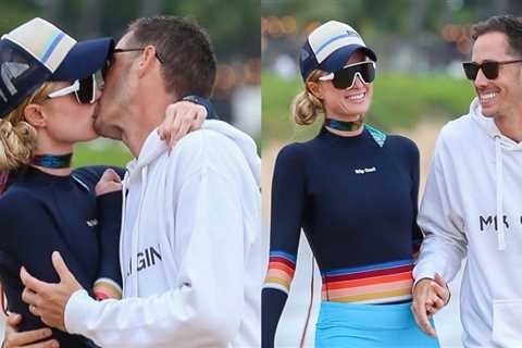 Paris Hilton & husband Carter Reum share a sweet kiss while vacationing in Maui